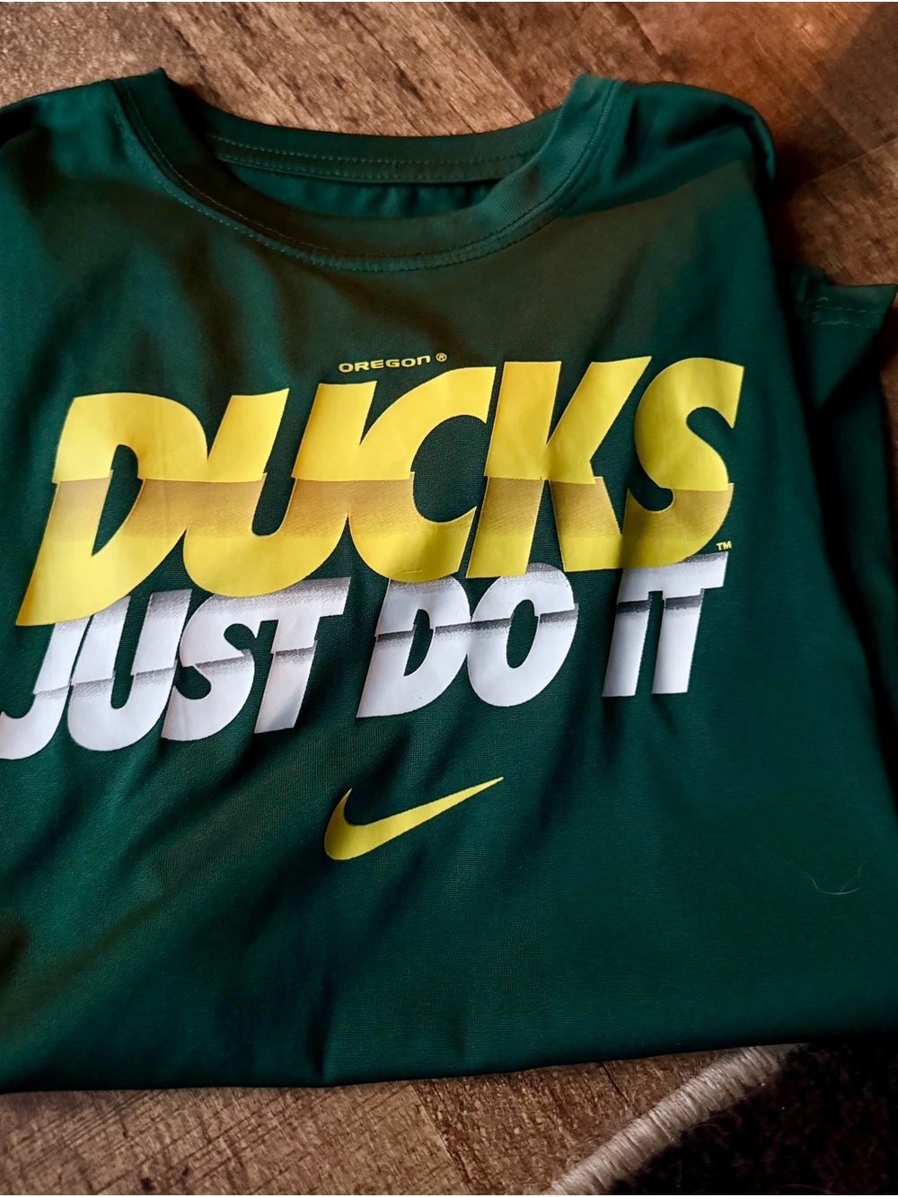 Nike Green Tee with Yellow and White 'Ducks Just Do It' Graphic